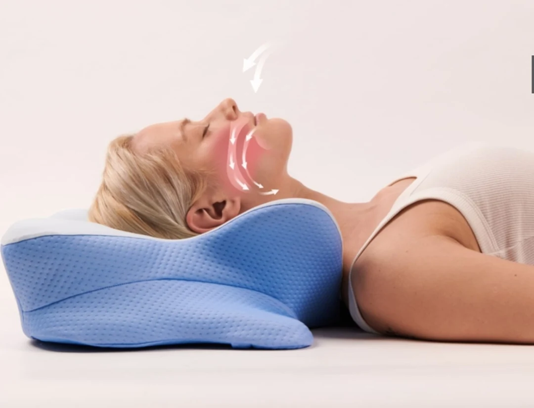 Derila ERGO contoured pillow supporting a back sleeper’s neck alignment