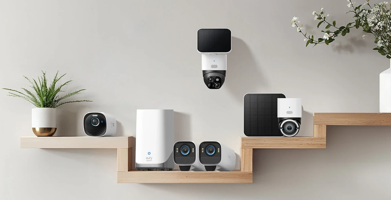 eufy Security HomeBase and cameras arranged on a shelf with solar panel